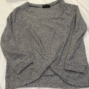 Heathered grey twist front sweater.
